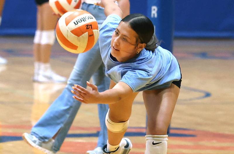 Genoa-Kingston’s Mia Wise dives for the ball Thursday, Aug. 1, 2024, during practice at the school in Genoa.