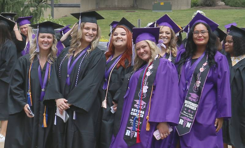 Illinois Valley Community College graduates pose for a photo during the 59th annual Commencement Ceremony on Saturday, May 17, 2025 at IVCC.
