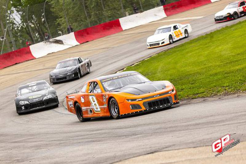 Cheryl Hryn's number 8 car circles the track at the Grundy County Speedway.