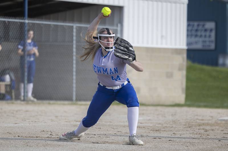 Newman’s Molly Olson fires a throw to first but was late for the out against Princeton Monday, April 29, 2024.