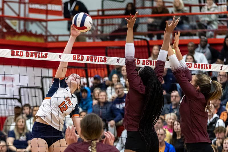 Oak Park-River Forest's Emmi Bozarth goes up for a kill during a 4A Supersectional girls volleyball game against Lockport at Hinsdale Central on Nov. 10, 2025.