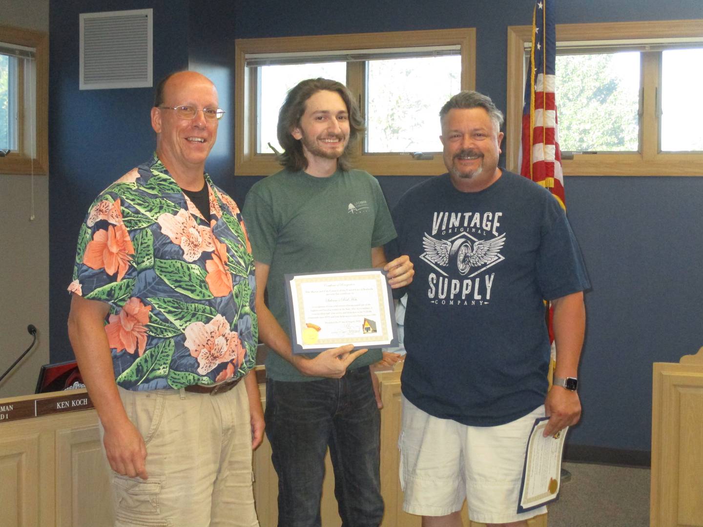 Tony Salerno, right, of Salerno's Red Hots and his son Anthony Salerno were honored by Yorkville Mayor John Purcell, left, at the Aug. 9, 2022 Yorkville City Council meeting. (Mark Foster -- mfoster@shawmedia.com)