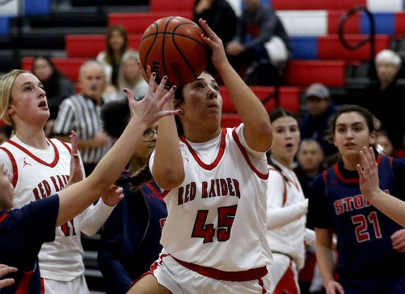 Huntley’s Madison Diaz drives to the basket against South Elgin on Tuesday, Nov. 21, 2023, during a basketball game in the Dundee-Crown High School Girls Thanksgiving Tournament in Carpentersville.