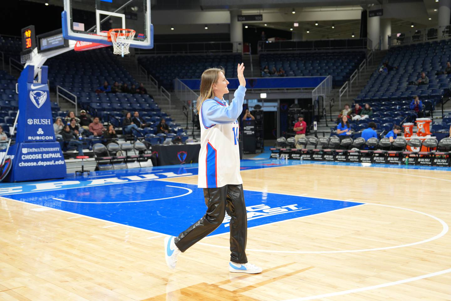 Allie Quigley waves at the crowd during halftime of the women's basketball game between DePaul and Providence on Sunday, January 12, 2025.