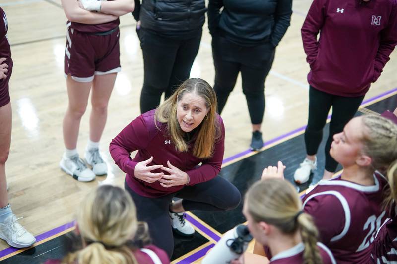 Marengo’s head coach Elisa Hanson talks to her players  during a basketball game against Plano at Plano High School on Wednesday, January 29, 2025.