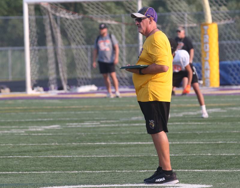 Mendota head football coach Jim Eustice watches his team play  St. Bede and Sandwich football duing a joint practice on Thursday, July 31, 2025 at Mendota High School.