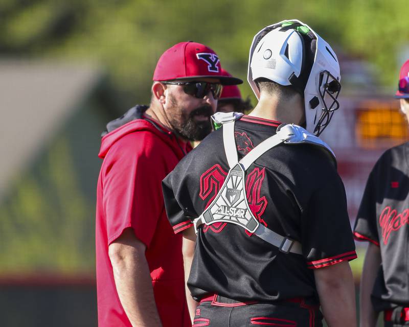 Yorkville's head coach Tom Cerven visits the mound during baseball game between Oswego at Yorkville. Thursday, May 8, 2025 in Yorkville.