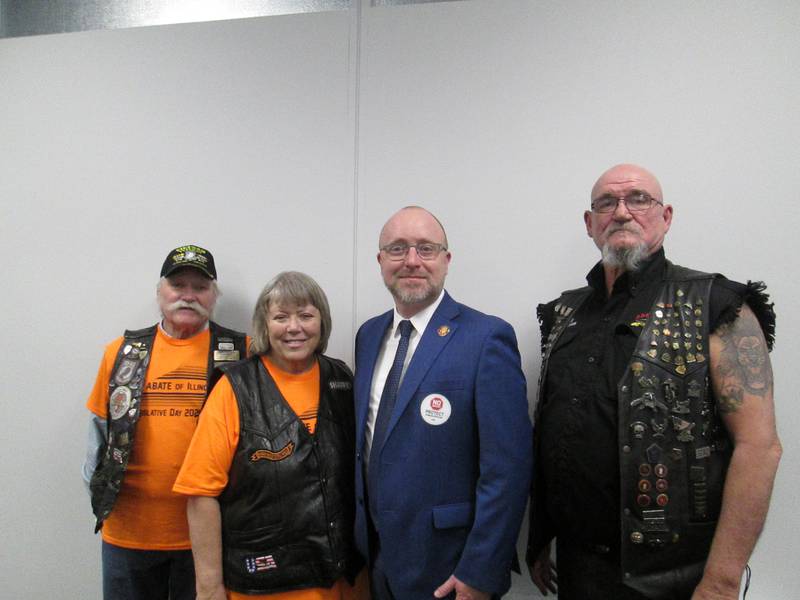 Open Roads ABATE members Linda Oleson (right), Cliff Oleson, and Sam Mataya (left) met with 75th District Representative Jed Davis.