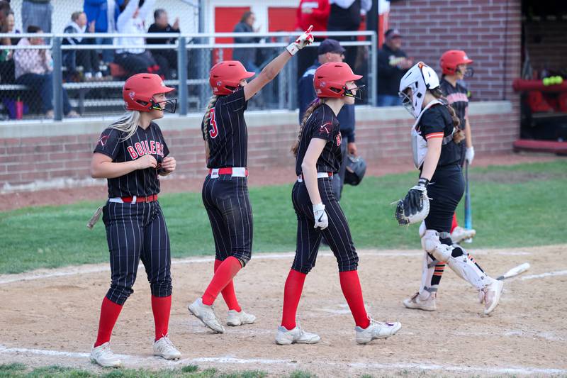 Bradley-Bourbonnais Bella Pusateri points to teammate Suttyn Hop at second base after Hope hit a three-RBI double during the Boilermakers' 8-0 victory over Normal Community in the IHSA Class 4A Bradley-Bourbonnais Regional semifinal on Tuesday, May, 27, 2025.