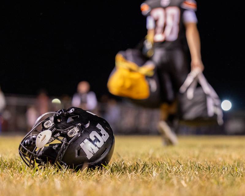 FCW helmet sits on field after win against Ridgewood on Friday, Sept. 26, 2025 at Woodland High School in Streator.