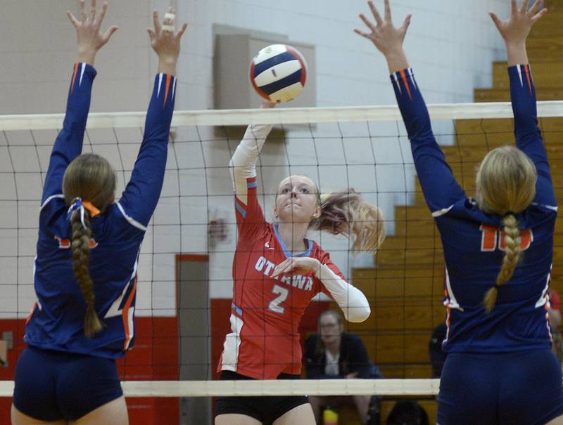 Ottawa’s Alyssa Malmassari splits the Pontiac defense with a shot  during the first match Tuesday at Streator.