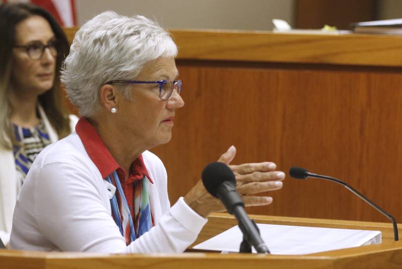 Carol Ruzicka, a retired Illinois Department of Children and Family Services supervisor, testifies during the second day of the trial for the former Illinois Department of Children and Family Services employees Carlos Acosta and Andrew Polovin before Lake County Judge George Strickland on Tuesday, Sept. 12, 2023, at the McHenry County Courthouse. Acosta, 57, of Woodstock, and Polovin, 51, of Island Lake, each are charged with two counts of endangering the life of a child and health of a minor, Class 3 felonies, and one count of reckless conduct, a Class 4 felony, related to their handling of the AJ Freund case.