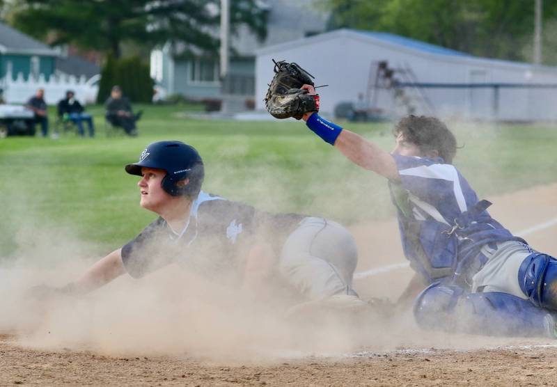Princeton catcher Ace Christiansen tags out Bureau Valley's Elijah Endress in the fourth inning of Monday's game at Prather Field. The Storm rallied for a 9-7 win with six runs in the seventh inning.
