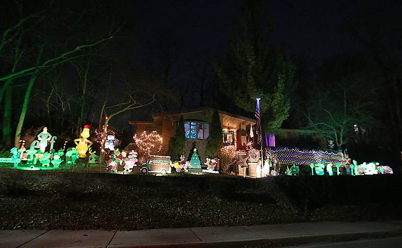 This hone has a massive Christmas display that covers the home and the hillside on Tuesday, Dec. 20, 2022 located at 25 Center Pl in Peru.