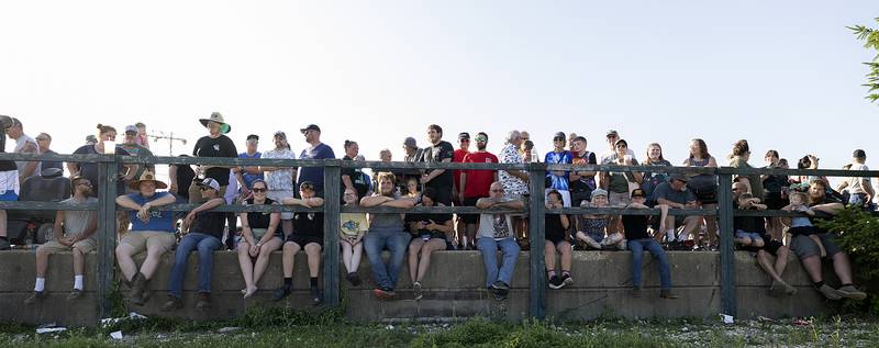 Fans line up in Rock Falls Thursday, June 19, 2025, to watch the burnout show.