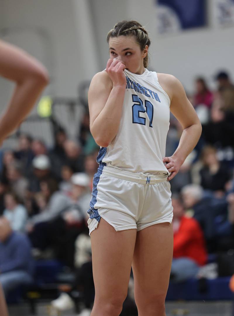 Nazareth's Olivia Austin (21) looks to the sideline while awaiting a free throw during the girls varsity basketball game between Benet and Nazareth academies on Wednesday, Jan. 3, 2023 in La Grange Park, IL.