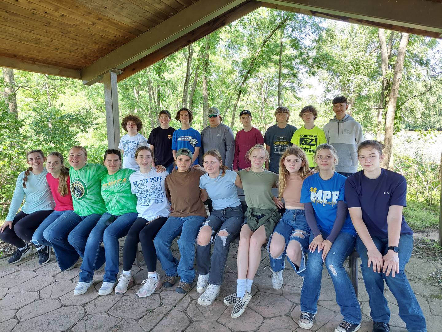 The eighth grade class at Milton Pope Elementary School in rural Marseilles poses for a class photo Wednesday, May 22, 2024, during their service day at Illini State Park. The students are (front, from left) Josie Mitchell, Jayden Spencer, Bailey Witte, Karleigh Davis, Kendall Read, Sophia Swift, Zoey Angelico, Maci Malone, Chloe Roberts, Emma Peterson, Lylah Hebel, (back) Brody Schutter, Everett Liberg, Brady Fort, Hayden Robertson, Zach Green, Caden Perry, Branson Hughes and Liam Muffler.
