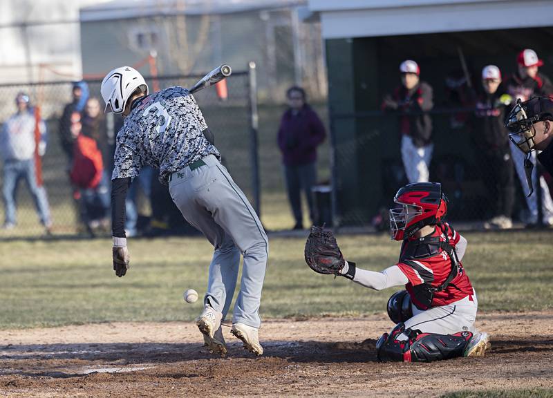 Rock Falls’ Victor Rivera gets hit by a pitch Monday, March 27, 2023 versus Erie-Prophetstown.