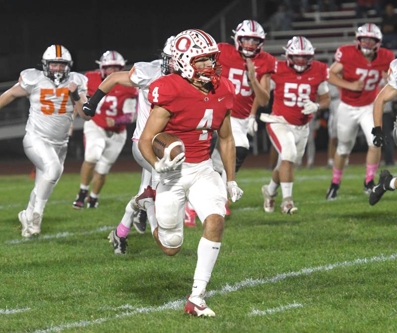 Oregon's Jakobi Donagen turns the corner en route to a touchdown during Friday, Oct. 17, 2025 action against Winnebago at Landers-Loomis Field in Oregon. The Hawks edged the Indians 20-18 to record their fifth win of the season.