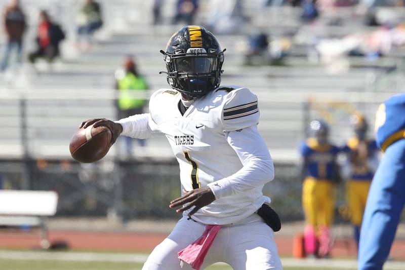 Joliet West’s Carl Bew looks to pass against Joliet Central on Saturday.