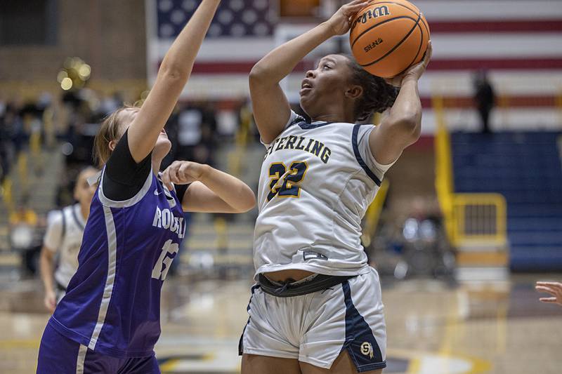 Sterling’s Joslyn Green puts up a shot over Rochelle’s Reese Kissack Tuesday, Jan. 6, 2026.
