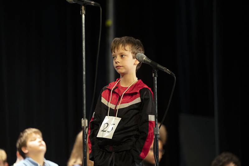 Ashton-Franklin Center fifth grader Tommy Gossett appears on stage Thursday, March 9, 2023 during the Lee-Ogle-Whiteside Regional Spelling Bee.