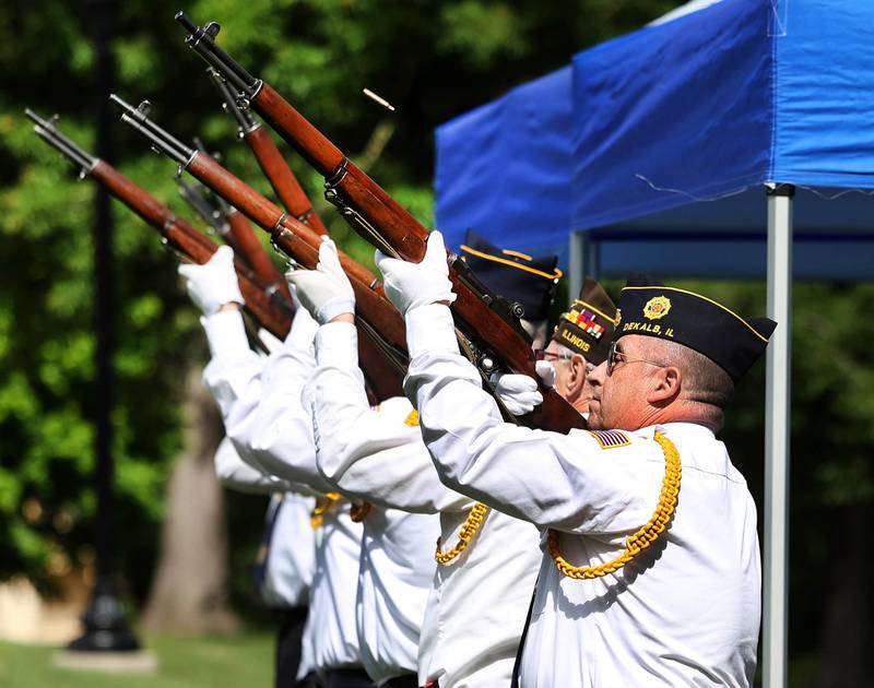 Members of the DeKalb American Legion Post 66 Honor Guard perform a rifle salute Monday, May 26, 2025, during the Memorial Day ceremony at Ellwood House in DeKalb.