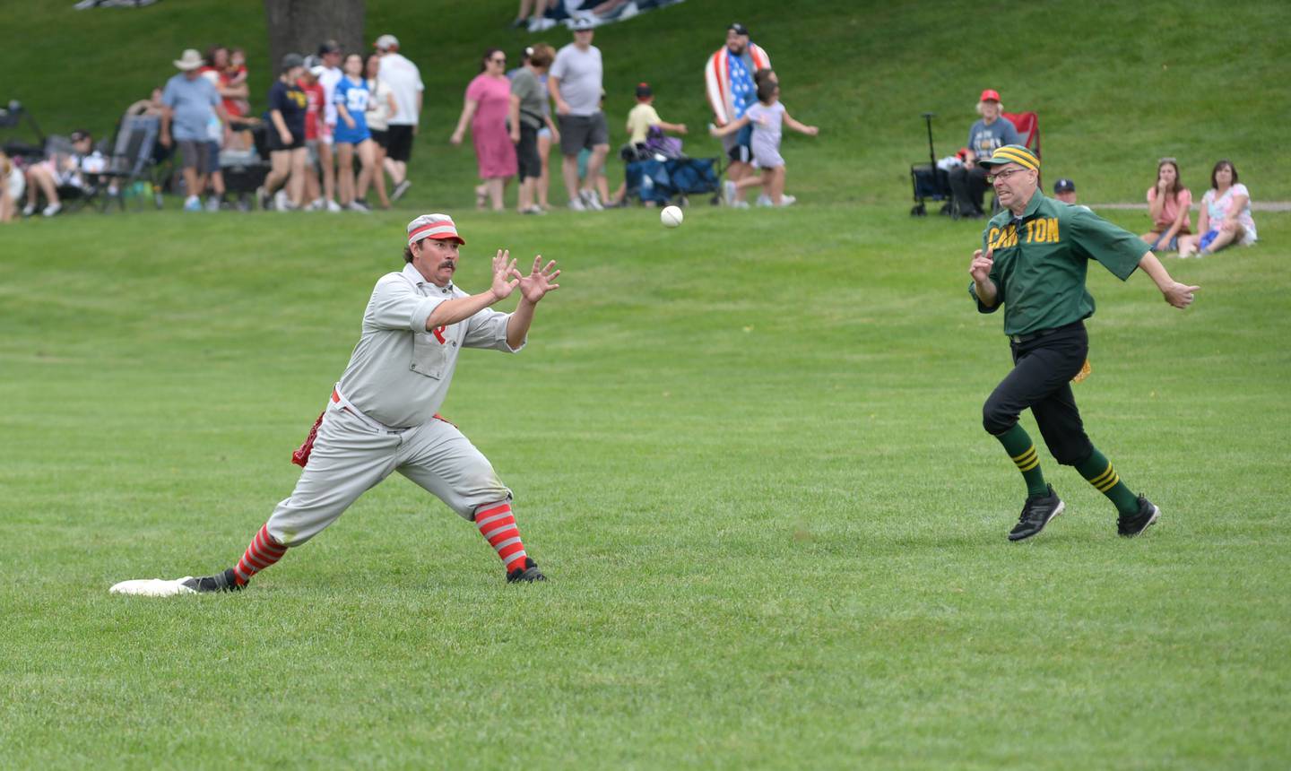 Oregon Ganymede second baseman Justin "Butter" Early gets ready to catch a throw and tag out a Canton runner at the 21st Annual World Tournament of Historic Base Ball in Dearborn, Michigan on Saturday, Aug. 10, 2024.