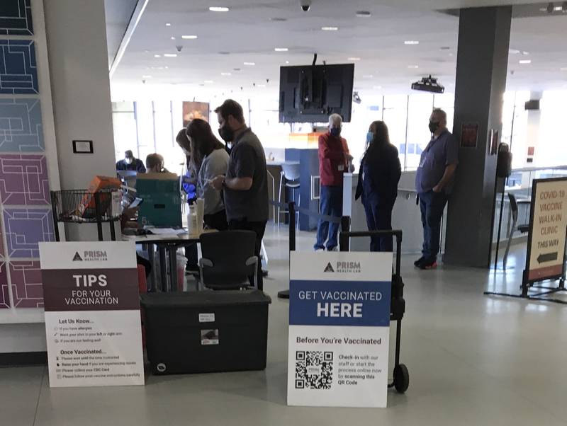 Waubonsee Community College staff, students and area residents lined up for a COVID-19 vaccine clinic held at the college's Sugar Grove campus on Wednesday, Dec. 8, 2021.