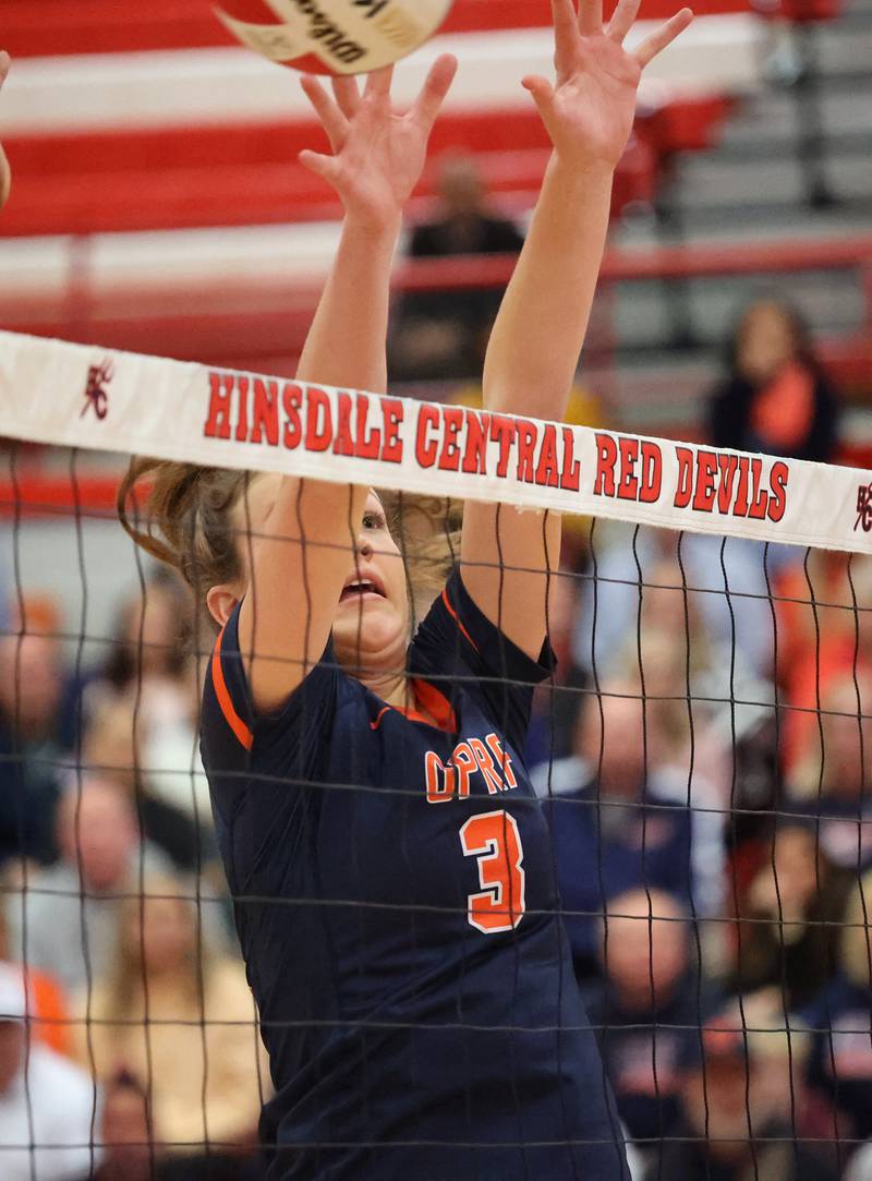 Oak Park-River Forest’s Ella Hulling (3) attempts to block a kill against Willowbrook during the 4A girls varsity volleyball sectional final match at Hinsdale Central high school on Wednesday, Nov. 1, 2023 in Hinsdale, IL.