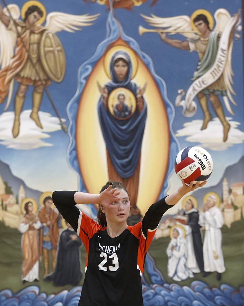 McHenry's Mollie Hobson lines up a serve during a nonconference volleyball match against Marian Central Monday, Aug. 28, 2023, at Marian Central Catholic High School.