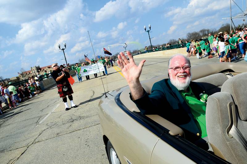 Grand Marshal Greg Langan waves from the St. Patrick's Day parade March 17, 2012 in Dixon.