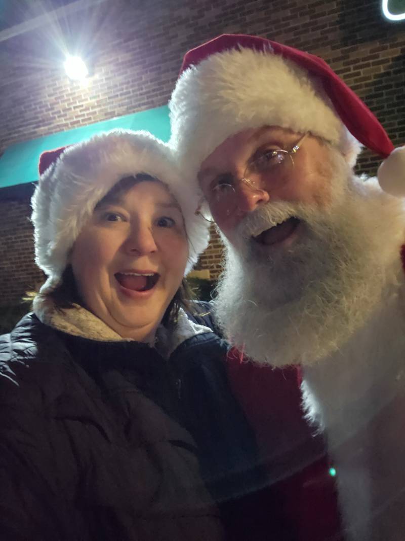Genoa Area Chamber of Commerce executive director Krissy Johnson poses with Santa at the chamber's annual Celebrate the Season and Jingle Bell parade. The event returns Dec. 5, 2025.