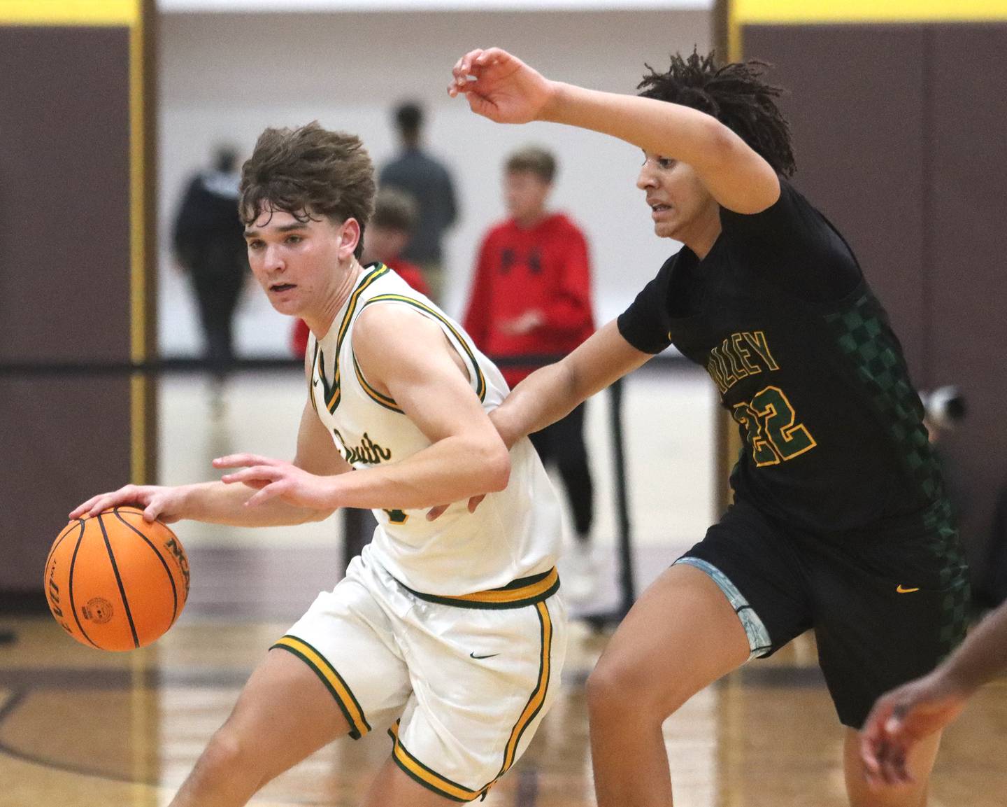 Crystal Lake South’s Nick Stowasser, left, moves the ball against Waubonsie Valley during Hinkle Holiday Classic varsity boys basketball tournament title game action on Friday, Dec. 27, 2024 at Jacobs High School in Algonquin.