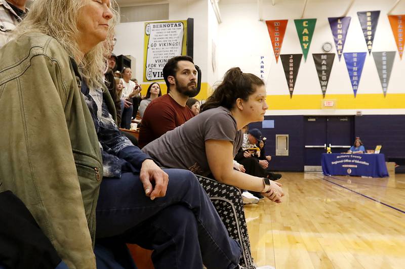 Lexi Zoller  leans forward as she watches her daughter, Lia Zollor, of Spring Grove Elkmetrary School, compete in the McHenry County Regional Office of Education’s 2025 Spelling Bee on Wednesday, March 19, 2025 at Bernotas Middle School in Crystal Lake.