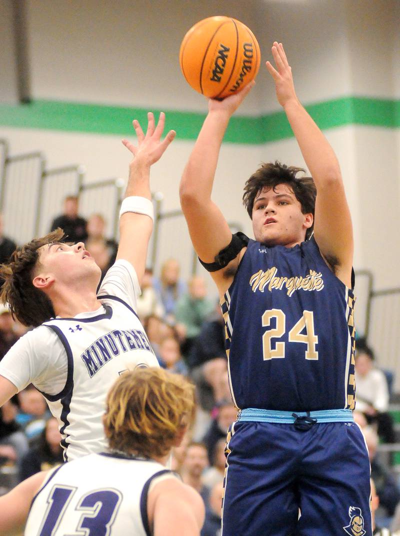 Marquette's Matt Graham (24) attempts a three-pointer as Lexington's Bo Stutzman in the Shipyard Showdown semifinals on Friday, Dec. 26, 2025 in Seneca.