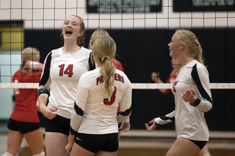 Erie-Prophetstown celebrate their first set win against OregonTuesday, Oct. 28, 2025, in the Class 2A regional semifinal at Rock Falls.