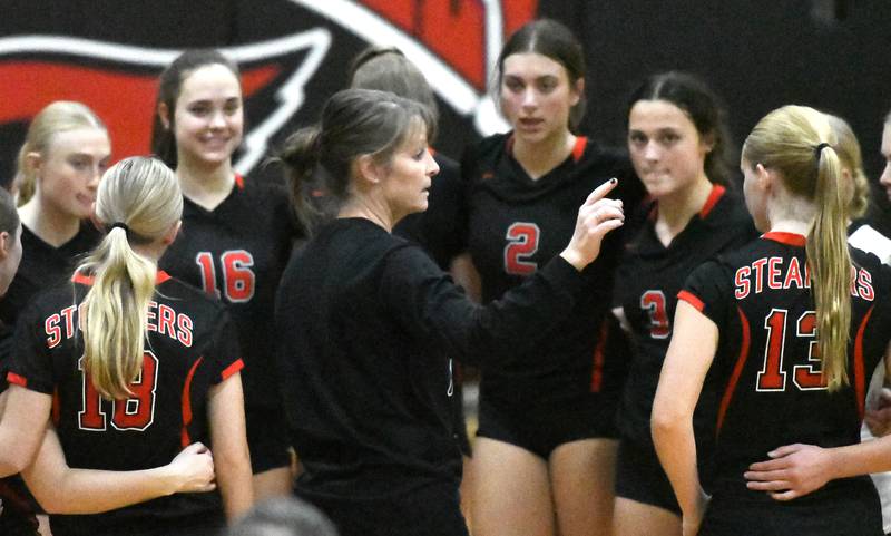 Fulton coach Stacy Germann talks to her team during a time out at the Stillman Valley Tournament on Saturday, Oct. 25, 2025 at Stillman Valley High School.