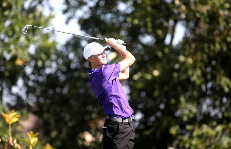 Downers Grove North’s Colton Presson tees off during the Class 3A Plainfield North Boys Golf Sectional at Whitetail Ridge Golf Course in Yorkville on Monday, Oct. 2, 2023.