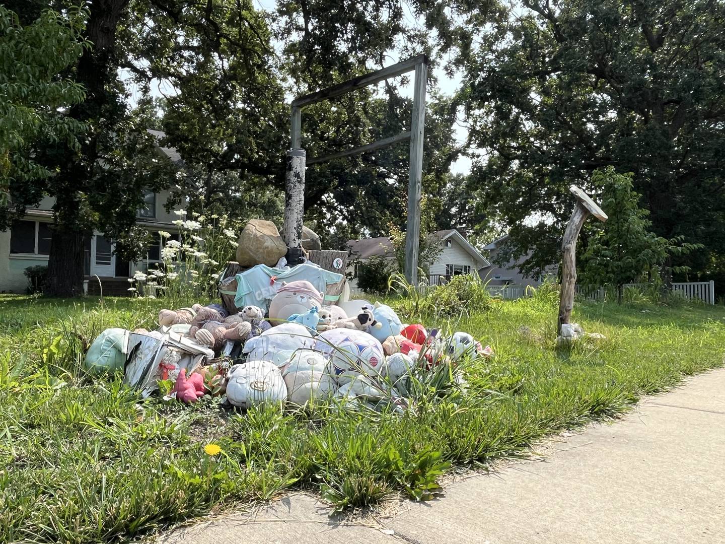 A small memorial for Wadee Alfayoumi, 6, still remains standing on Friday, July 26, 2024, outside the Plainfield Township residence where he resided with his mother, Hanan Shaheen.