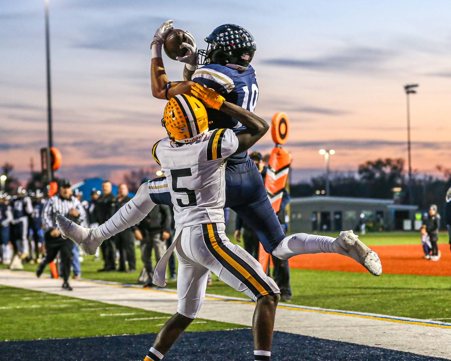 IC Catholic Prep's Eric Karner (19) comes down with a touchdown catch during Class 4A third round playoff football game between St Laurence at IC Catholic Prep.  Nov 11, 2023.