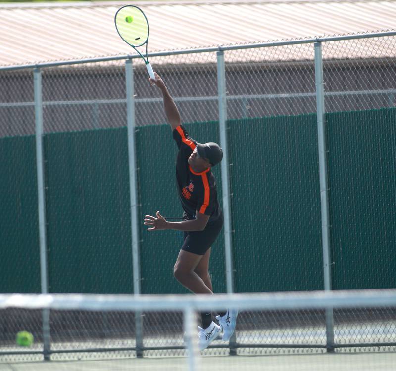DeKalb’s Matthew Williams serves the ball during the first round of the 2A boys state tennis meet with doubles partner Rylan Lottes (not pictured) on Thursday, May 29. 2025 at Hersey High School.