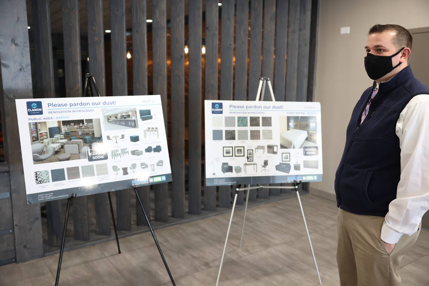 Dan Scott, Vice President of Operations, stand in front of the designs for the renovations for the Clarion Hotel on 411 S. Larkin Ave. Thursday, Feb. 3, 2022, in Joliet.