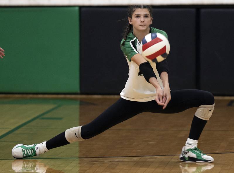 Rock Falls’ Kaltrina Lecaj plays a serve against Dixon Thursday, Sept. 19, 2024, in a Big Northern Conference match at RFHS.
