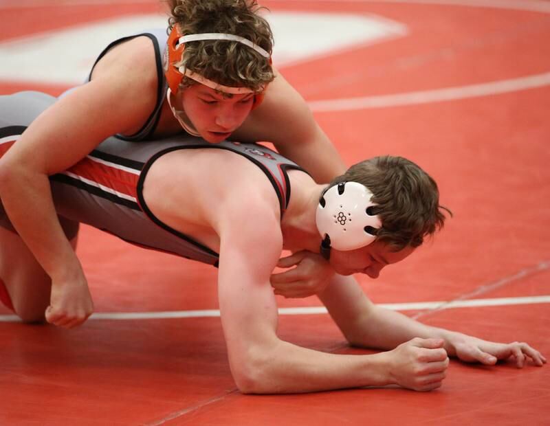 Ottawa's Malachi Snyder wrestles Sandwich's Kai Kern on Thursday, Jan. 12, 2023 in Kingman Gymnasium at Ottawa High School.