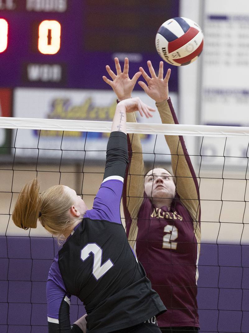 Morris’ Alexis Williams go up for a block against Dixon’s Madyson Tichler Thursday, Oct. 31, 2024 in the class 3A regional championship at Dixon High School.