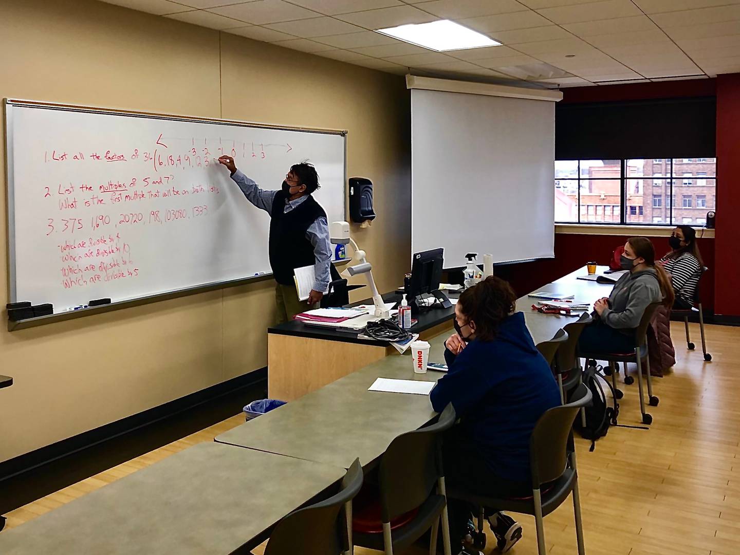 John Gutman teaching math class at Waubonsee Community College in Aurora. (David Petesch - dpetesch@shawmedia.com)