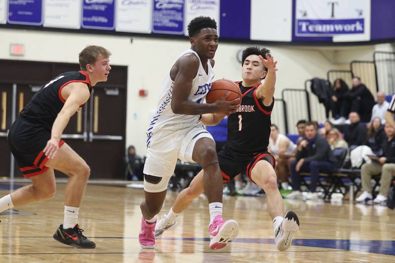 Lincoln-Way East’s Karson Thomas drives to the basket against Bolingbrook on Tuesday, Dec.12th, 2023 in Frankfort.