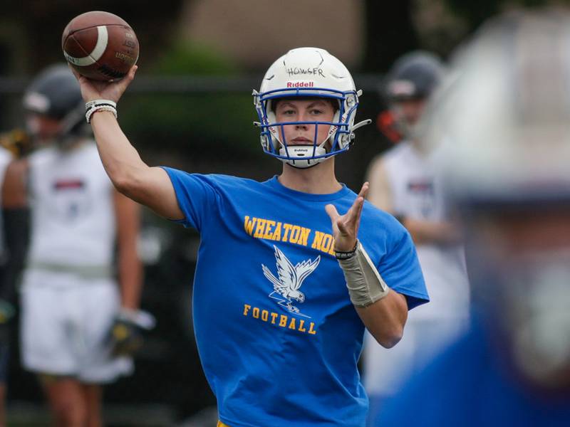 Wheaton North’s Max Houser passes the ball during the Downers Grove South 7-on-7 in Downers Grove on Saturday, July 16, 2022.