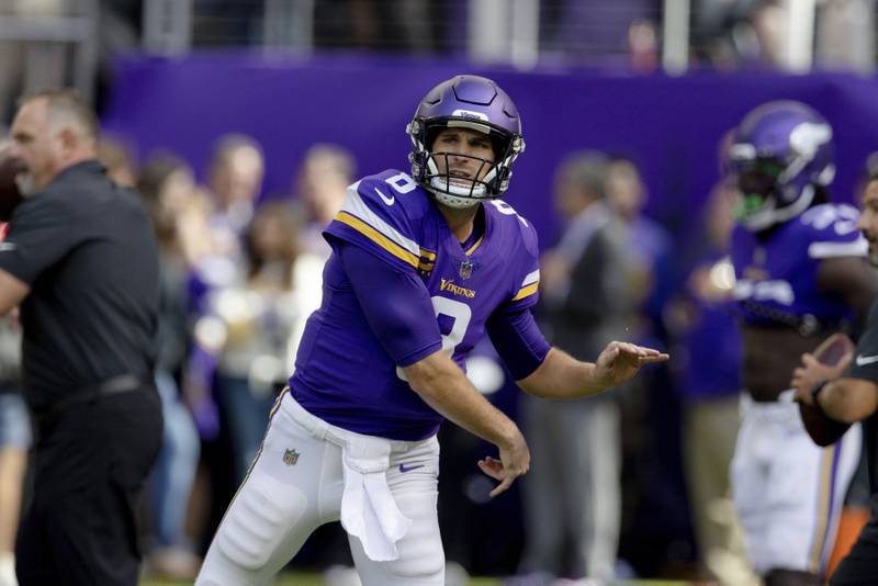 Minnesota Vikings quarterback Kirk Cousins (8) on the field during warmups prior to an NFL football game against the Detroit Lions, Sunday, Sept. 25, 2022 in Minneapolis. (AP Photo/Stacy Bengs)